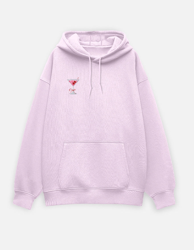Pink unisex oversized hoodie with pink cocktail embroidery – cozy streetwear with dropped shoulders